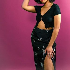 Black maxi wrap skirt with purple flower print.